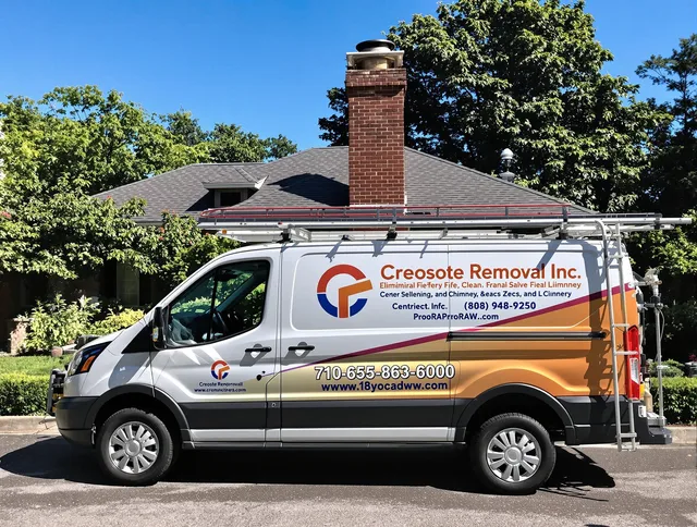 Wickliffe Chimney Sweep technician removing creosote safely in Wickliffe, OH